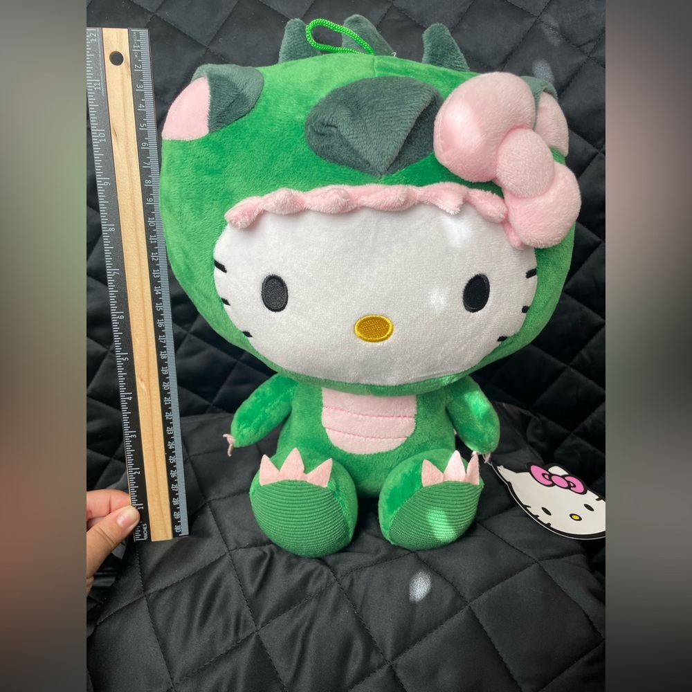 Hello kitty 12’ plush doll in dinosaur costume